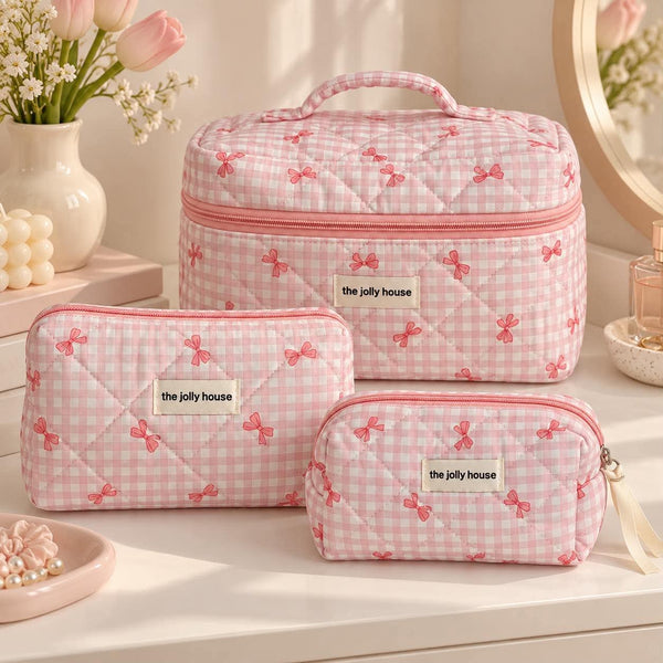 Trousse matelassée à nœuds