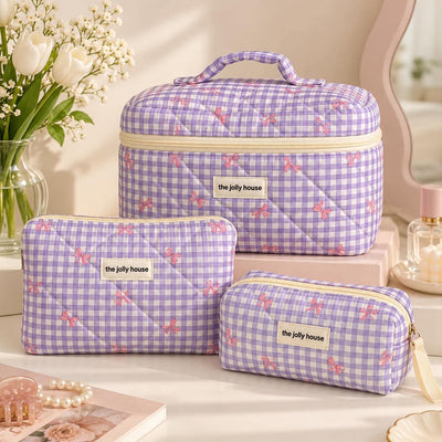 Trousse matelassée à nœuds